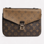 Reverse monogram pochette metis